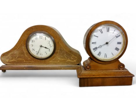 A late 19th century mahogany mantel clock, Roman numerals, drum case on scroll spreading square pedestal, 17cm high, c.1890;&