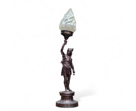 A late 19th century spelter figural library lamp, of Ajax, frosted torch shade, 69cm high, c.1880 
