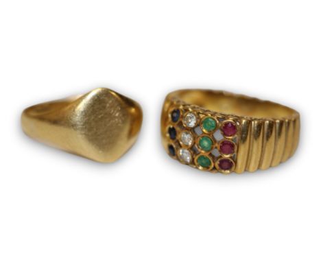 An 18ct gold signet ring, size L 1/2, 2.92g; an 18ct gold ring, ribbed shank set with four rows of three collet set sapphires