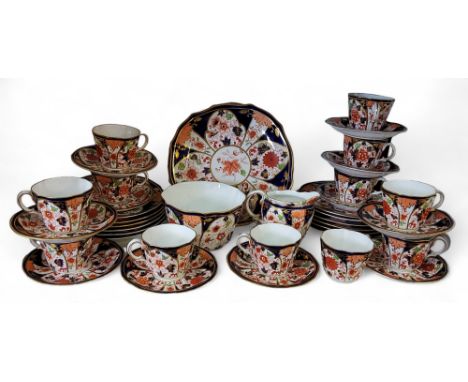 A Royal Crown Derby&nbsp; Imari tea service, for twelve comprising eleven cups, saucers, side plates, two bread and butter pl