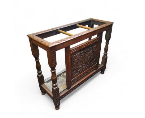 A late Victorian English oak country house walking stick or hall stand, carved oak leaf top with brass partitions, central ca