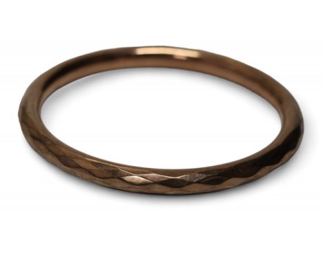 A 9ct rose gold bangle, geometric pattern, H G &amp; S, Chester, 1924, 9cms dia., William Griffiths &amp; Sons, Chester, 1924