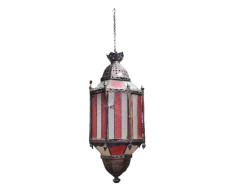 Lighting - a substantial Middle Eastern lantern, pressed cranberry and clear glass with ornate foliate swags, bronzed metal m