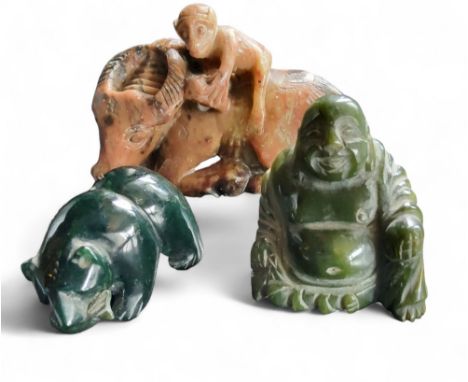 A 19th century Chinese soapstone model, carved with a money seated on a oxen, 10cm wide;&nbsp; &nbsp;a hardstone Buddha;&nbsp