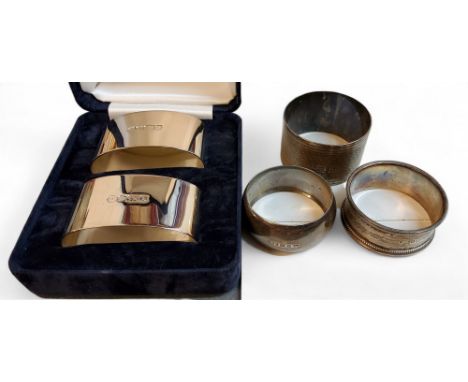 A pair of silver napkin ring, Sheffield 1997, cased;&nbsp; others&nbsp; (5) 