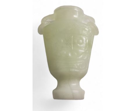 A Chinese white jade flat sided vase, ring loop handles, 11.5cm high 