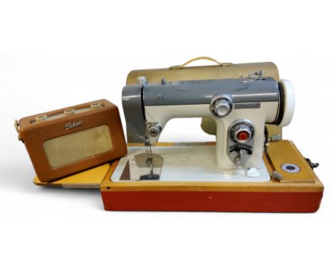 A Jones sewing machine, cased; Roberts Transistor radio, model 200 (2) 
