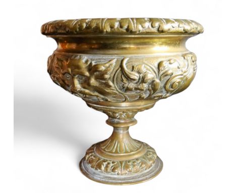 A 19th century Grand Tour bronze pedestal campana shaped urn, cast with masks and scrolls, 10.5cm high, c.1850 