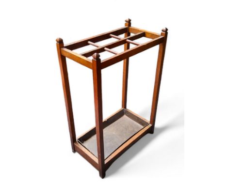 An Arts &amp; Crafts oak walking stick stand c.1920 