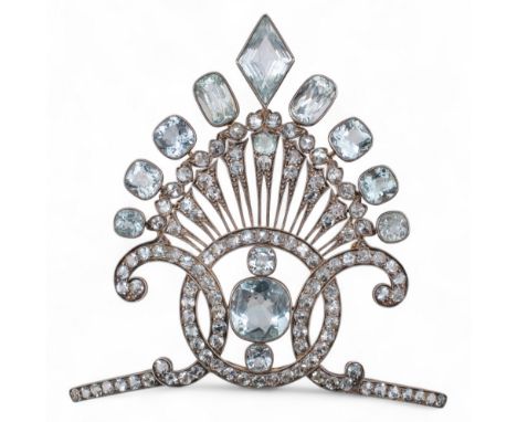 Russian, Circa 1910 A striking aquamarine aigrette-style tiara, convertible to form a brooch. Set to the centre within a circ