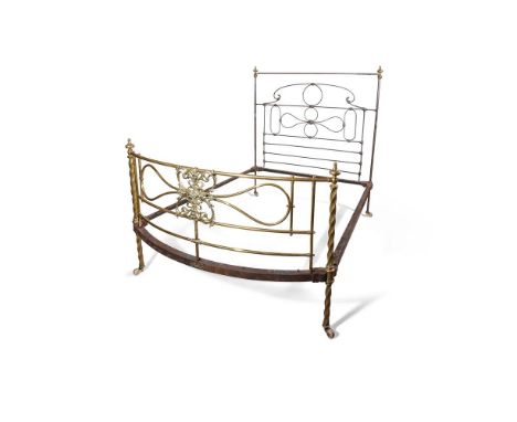A VICTORIAN BRASS AND STEEL DOUBLE BED FRAME BY R. W. WINFIELD & CO., SECOND HALF 19TH CENTURY The footing with a brass maker