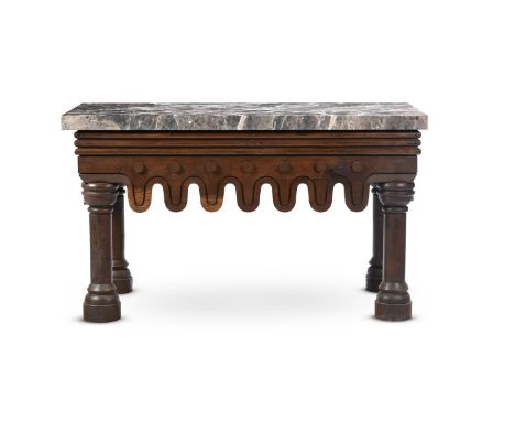 AN UNUSUAL OAK CONSOLE TABLE  IN THE MANNER OF THOMAS HOPPER, MID 19TH CENTURY  With a Giallo e Nero di Calabria marble top 8