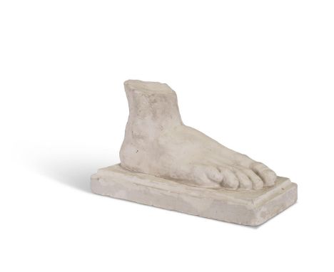 AFTER THE ANTIQUE, A PLASTER MODEL OF A FOOT  20TH CENTURY  21cm high, 32cm wide, 15cm deep Visitors on the Grand Tour were k