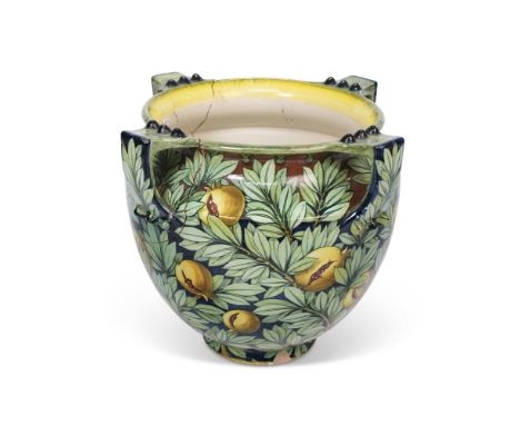 A LARGE POTTERY PLANTER IN THE ARTS AND CRAFTS STYLE, LATE 19TH OR EARLY 20TH CENTURY  Decorated with branches of pomegranate