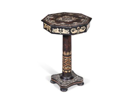AN UNUSUAL REGENCY SIMULATED ROSEWOOD, PAINTED AND PENWORK DECORATED OCTAGONAL OCCASIONAL TABLE CIRCA 1815 The hinged top ope