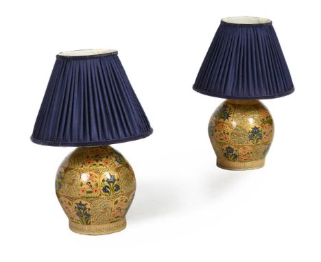 A PAIR OF KASHMIRI GILT AND POLYCHROME PAINTED TABLE LAMPS  FIRST HALF 20TH CENTURY  Rewired and PAT tested  each 26cm high (