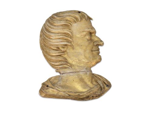A CARVED GILTWOOD PROFILE PORTRAIT PLAQUE  LATE 18TH OR EARLY 19TH CENTURY  Depicting a man facing to left, long hair and Rom