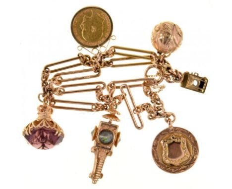 GOLD COIN. HALF SOVEREIGN 1910, A 9CT GOLD FOB SHIELD, AN AMETHYST SET GOLD FOB, MARKED 9CT, A 9CT GOLD LANTERN CHARM AND TWO