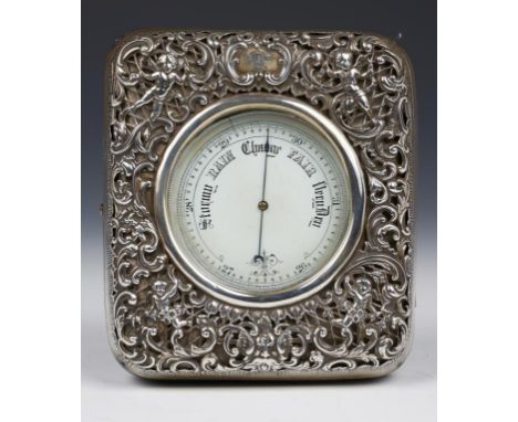 A VICTORIAN SILVER MOUNTED LEATHER BAROMETER CASE AND A CONTEMPORARY NICKEL PLATED ANEROID BAROMETER, the first crested, the 