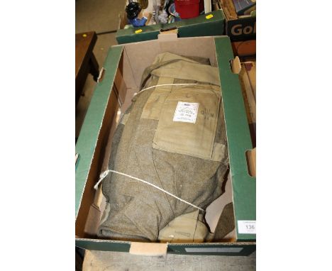 A BOX CONTAINING AN ORIGINAL UNISSUED TIED BUNDLE OF FIVE BRITISH ARMY 1949 PATTERN BATTLE DRESS BLOUSES