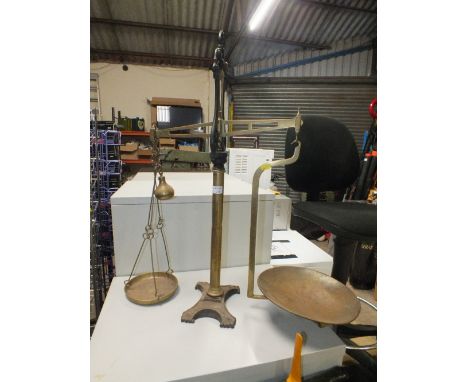 A LARGE SET OF BRASS SCALES