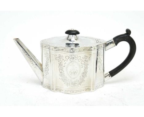 A George III silver teapot, possibly by Joseph Locke, London 1784, of commode form, with ebony handle and finial, engraved wi