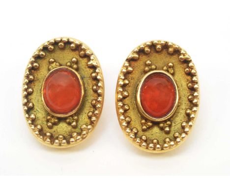 A pair of fire opal and yellow metal earrings, each set with fire opal cabochon, measuring approximately 8.2 x 6.8mm, in coll