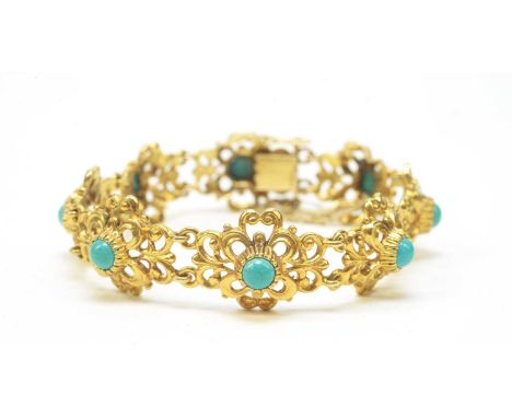 A turquoise set 9ct yellow gold bangle, of eight scrolling links each set with turquoise cabochon, 19cms long, 25.8g gross.