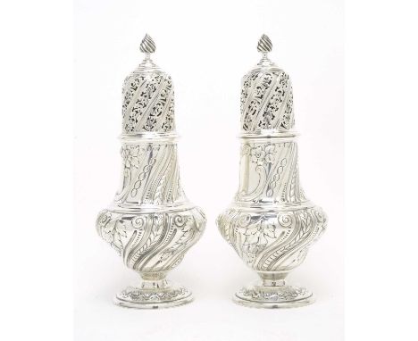 A pair of large Victorian silver casters, by Thomas Bradbury &amp; Sons, London 1890, of typical baluster form, with twisted 