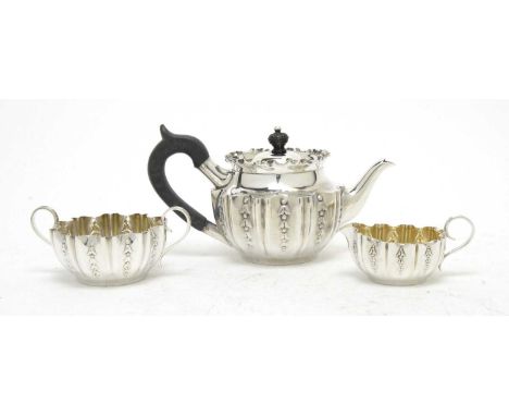 A Victorian three-piece bachelor's tea service, by Fenton Bros., Sheffield 1894, comprising: teapot, two-handled sugar bowl a