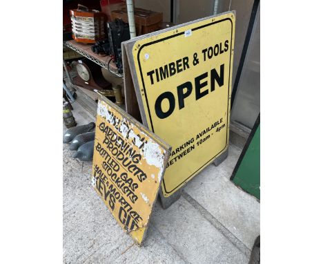 A 'TIMBER AND TOOLS' WOODEN A BOARD SIGN AND A FURTHER WOODEN SIGN 