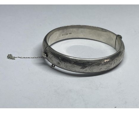 A HALLMARKED BIRMINGHAM SILVER BANGLE WEIGHT 21.3 GRAMS 