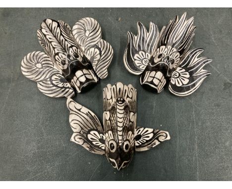 THREE BLACK AND WHITE PAINTED AZTEC SMALL MASKS 