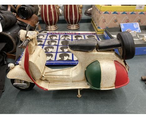 A CLASSIC ITALIAN TIN PLATE METAL SCOOTER MODEL 