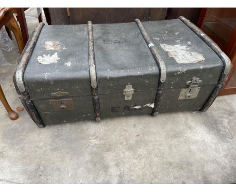 A COMPRESSED FIBRE TRAVELLING TRUNK BY WM. PARKS LTD, EASTBOURNE 