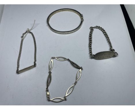 FOUR VARIOUS SILVER BRACELETS TO INCLUDE A CLEAR STONE BANGLE AND TWO IDENTITY BRACELETS WEIGHT 44.3 GRAMS 