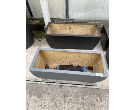 A PAIR OF LOW FIBRE GLASS TROUGH PLANTERS (L:50CM) 