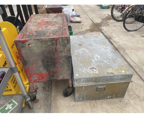 A LARGE GALVANISED STORAGE TRUNK AND A FOUR WHEELED WORKSHOP TROLLEY 