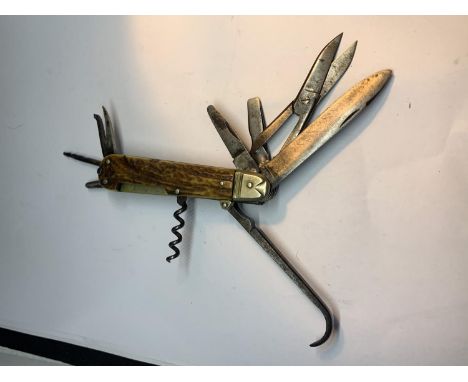 A VINTAGE SHEFFIELD COACHMANS KNIFE 