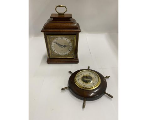 A HEAVY GARRARD AND CO MANTLE CLOCK PLUS A SMALL 'SHIP'S WHEEL' BAROMETER 