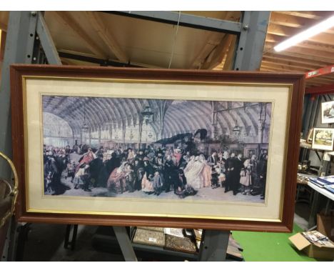 A LARGE FRAMED VICTORIAN TRAIN PRINT AT THE STATION, 40 X 22" 