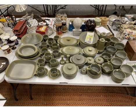 A LARGE VINTAGE WEDGWOOD 'CAMBRIAN' DINNER SERVICE IN SAGE GREEN TO INCLUDE SERVING TUREENS, PLATES, LARGE SERVING BOWLS, A T