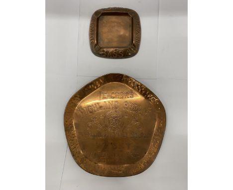 A VINTAGE COPPER TEACHER'S WHISKY TRAY AND A COPPER 'BASS IN BOTTLE' ASHTRAY 