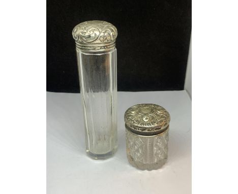 TWO VINTAGE GLASS JARS WITH HALLmaRKED SILVER TOPS ONE BIRMINGHAM AND ONE LONDON 