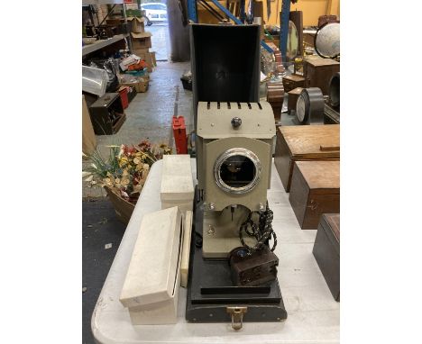A VINTAGE JOHNSON OPTISCOPE MODEL 12 LANTERN WITH ACCESSORIES 