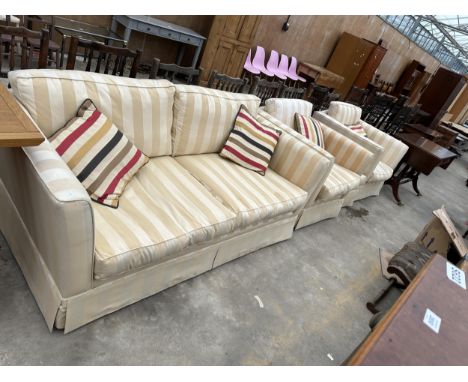 A MODERN CREAM STRIPED LOUNGE SUITE COMPRISING A THREE SEATER SETTEE, TWO EASY CHAIRS, POUFFE AND THREE CUSHIONS 