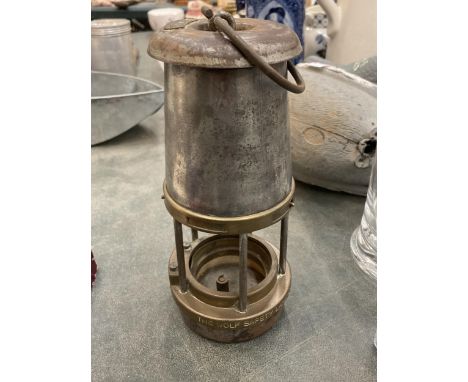 A VINTAGE 'THE WOLF' SAFETY MINERS LAMP 