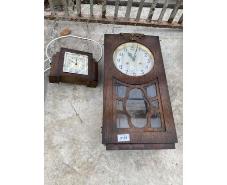 AN OAK CASED CHIMING WALL CLOCK AND A FURTHER OAK MANTLE CLOCK 