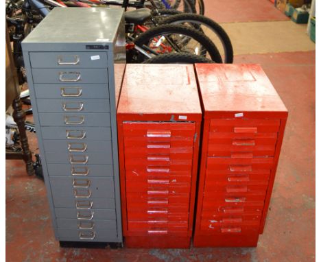 3 metal filing cabinets - one contains assorted tools.