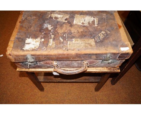 Vintage suitcase with stand